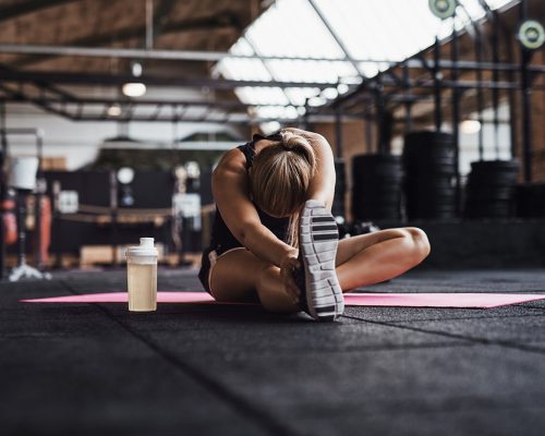 fit-young-woman-doing-stretches-on-a-gym-floor-QVWG8LX-min.jpg fit-young-woman-doing-stretches-on-a-gym-floor-QVWG8LX-min.jpg